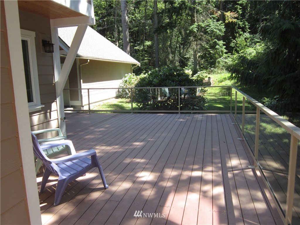 3540 7075 South Clinton, WA 98236 - Photo 20 of 25 a porch with seating space and yard