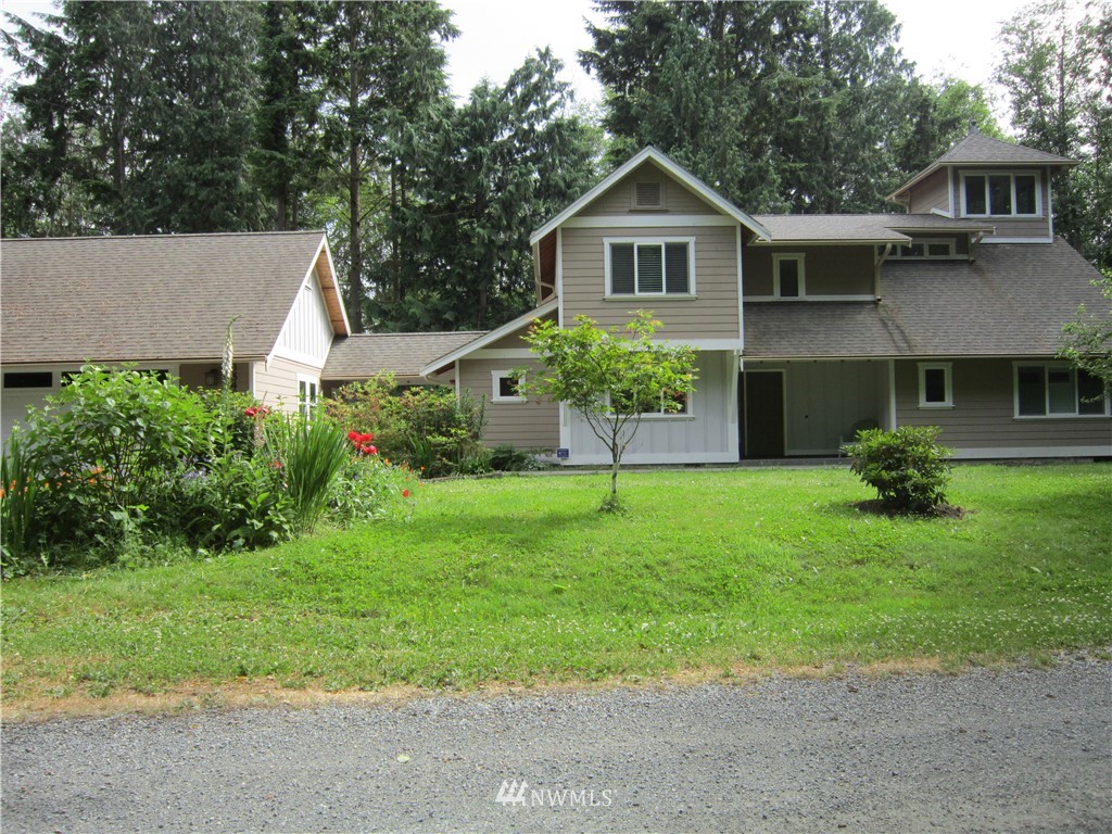 3540 7075 South Clinton, WA 98236 - Photo 25 of 25 a view of an house with backyard and garden