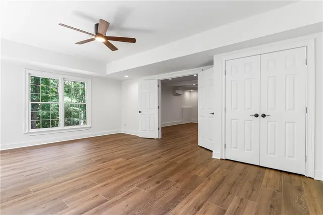 a view of balcony with wooden floor