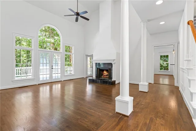 an empty room that has a window in it