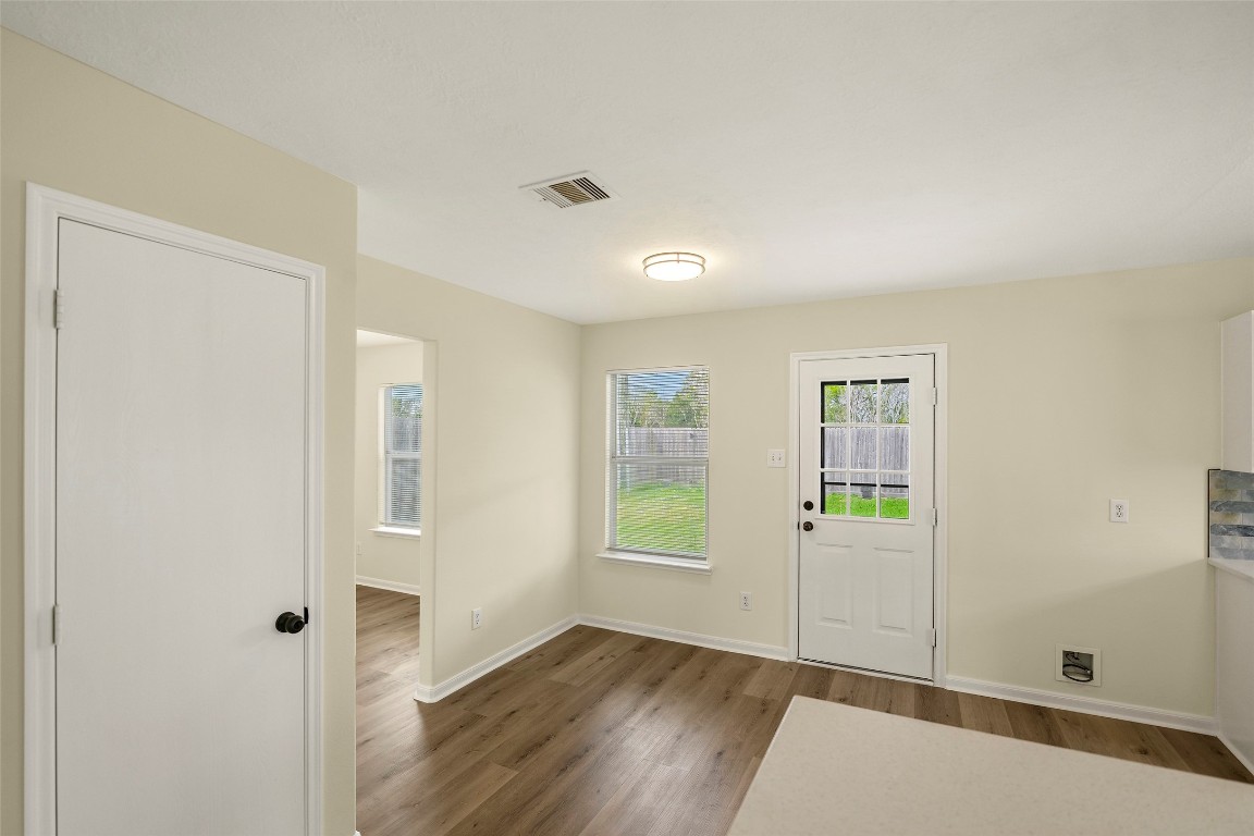 13226 Ridgewood Knoll Lane Houston, TX 77047 - Photo 17 of 37 an empty room with windows