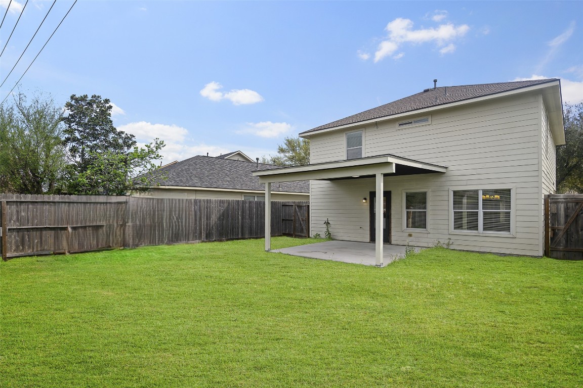 13226 Ridgewood Knoll Lane Houston, TX 77047 - Photo 33 of 37 a view of a house with a yard and porch