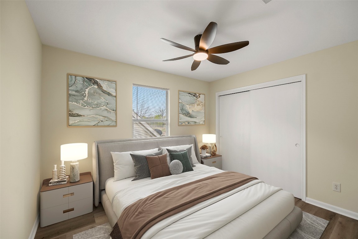 13226 Ridgewood Knoll Lane Houston, TX 77047 - Photo 6 of 37 a bedroom with a bed and a painting on the wall