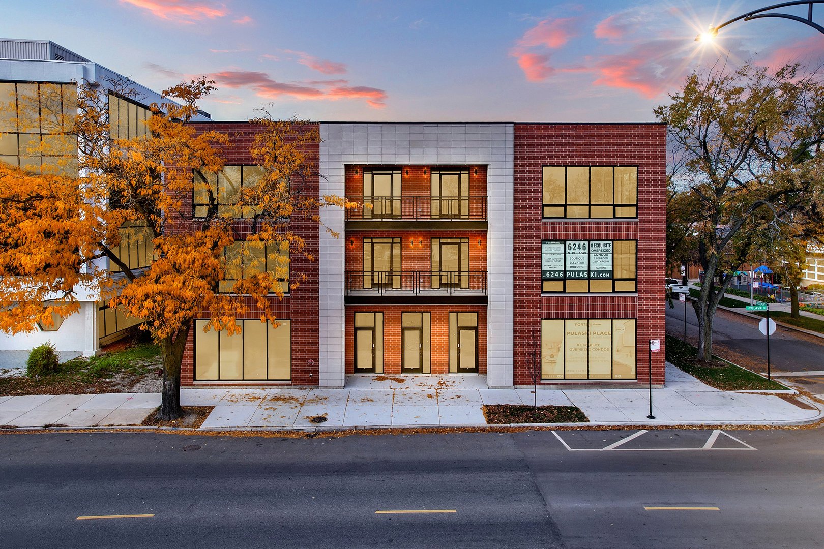 6246 North Pulaski Road, Unit 204 Chicago, IL 60646 - Photo 1 of 38 a front view of a building with a lot of windows
