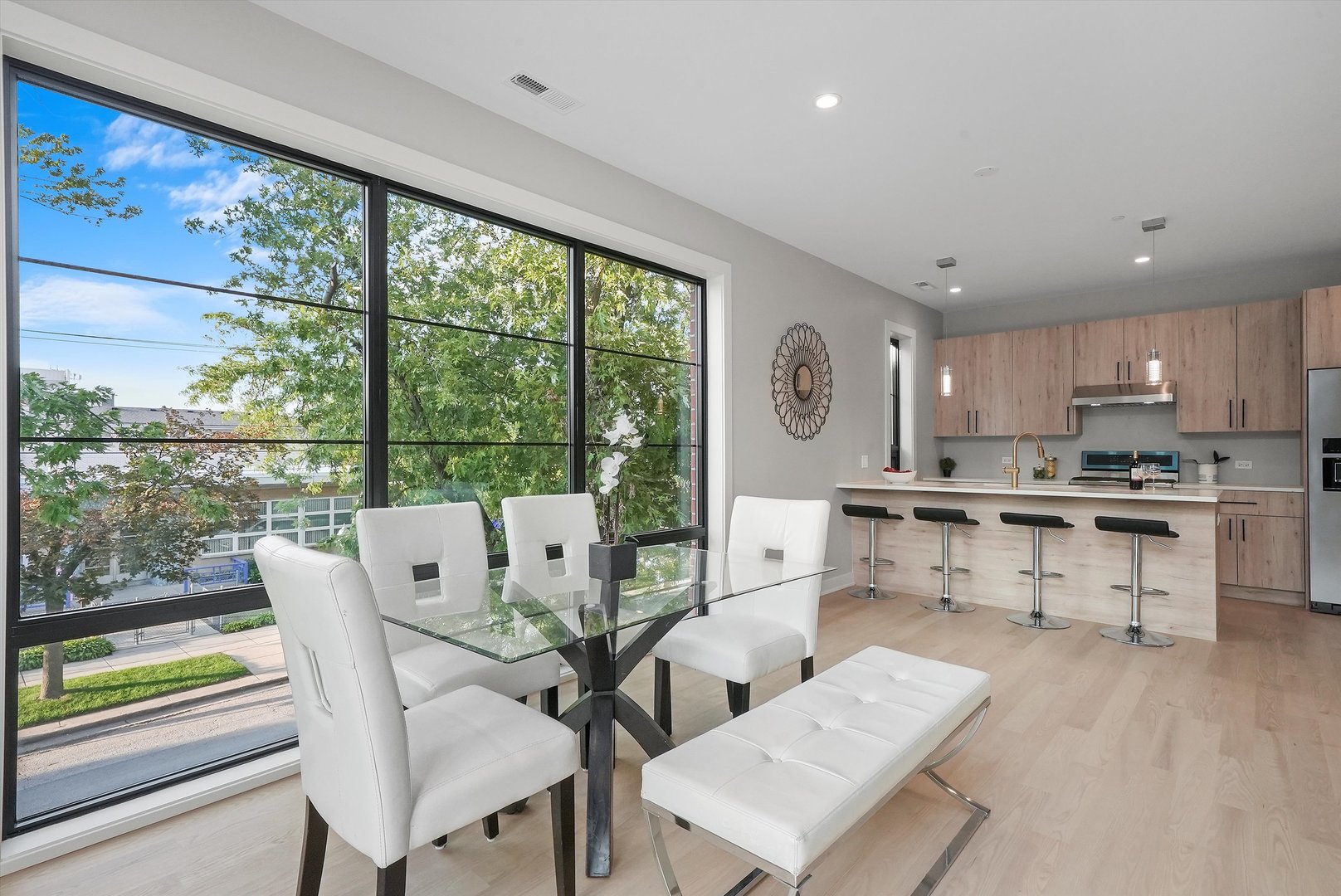 6246 North Pulaski Road, Unit 204 Chicago, IL 60646 - Photo 12 of 38 a living room with furniture and a large window