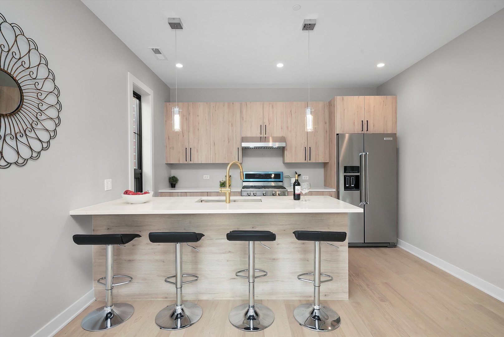 6246 North Pulaski Road, Unit 204 Chicago, IL 60646 - Photo 14 of 38 a kitchen with a sink a stove a refrigerator and cabinets