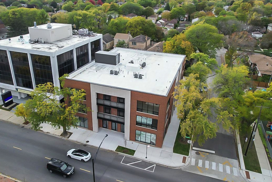 6246 North Pulaski Road, Unit 204 Chicago, IL 60646 - Photo 3 of 38 a view of a patio with table and chairs potted plants