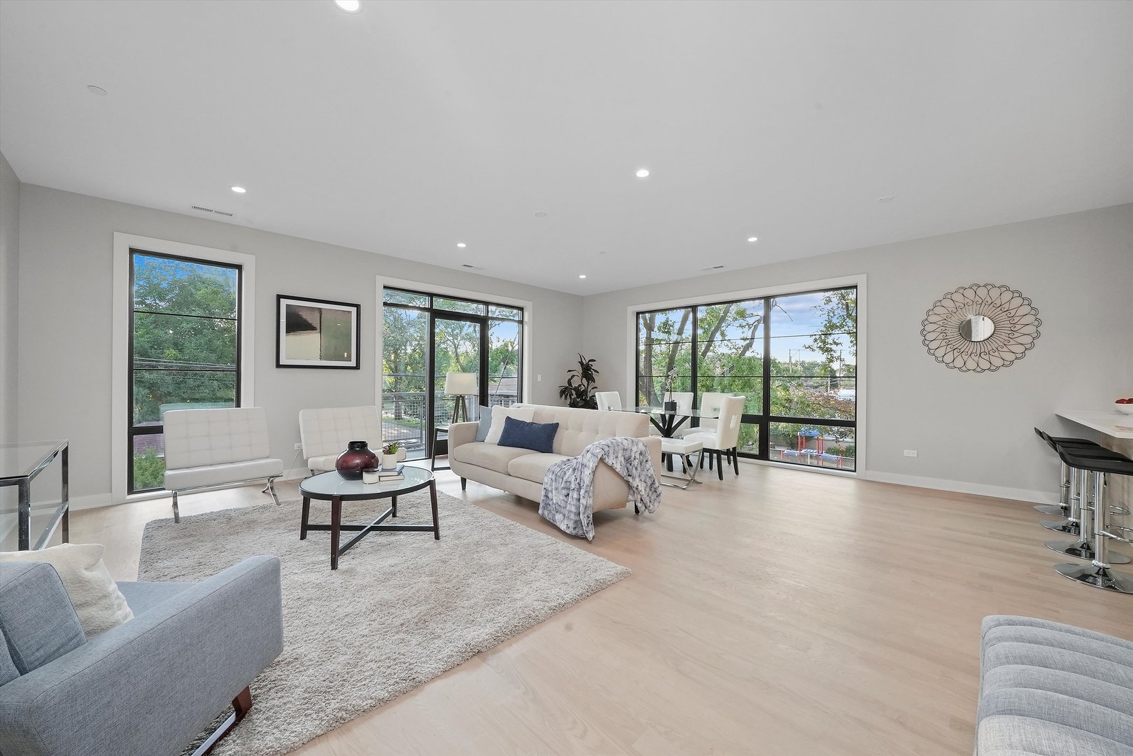 6246 North Pulaski Road, Unit 204 Chicago, IL 60646 - Photo 7 of 38 a living room with furniture and a large window