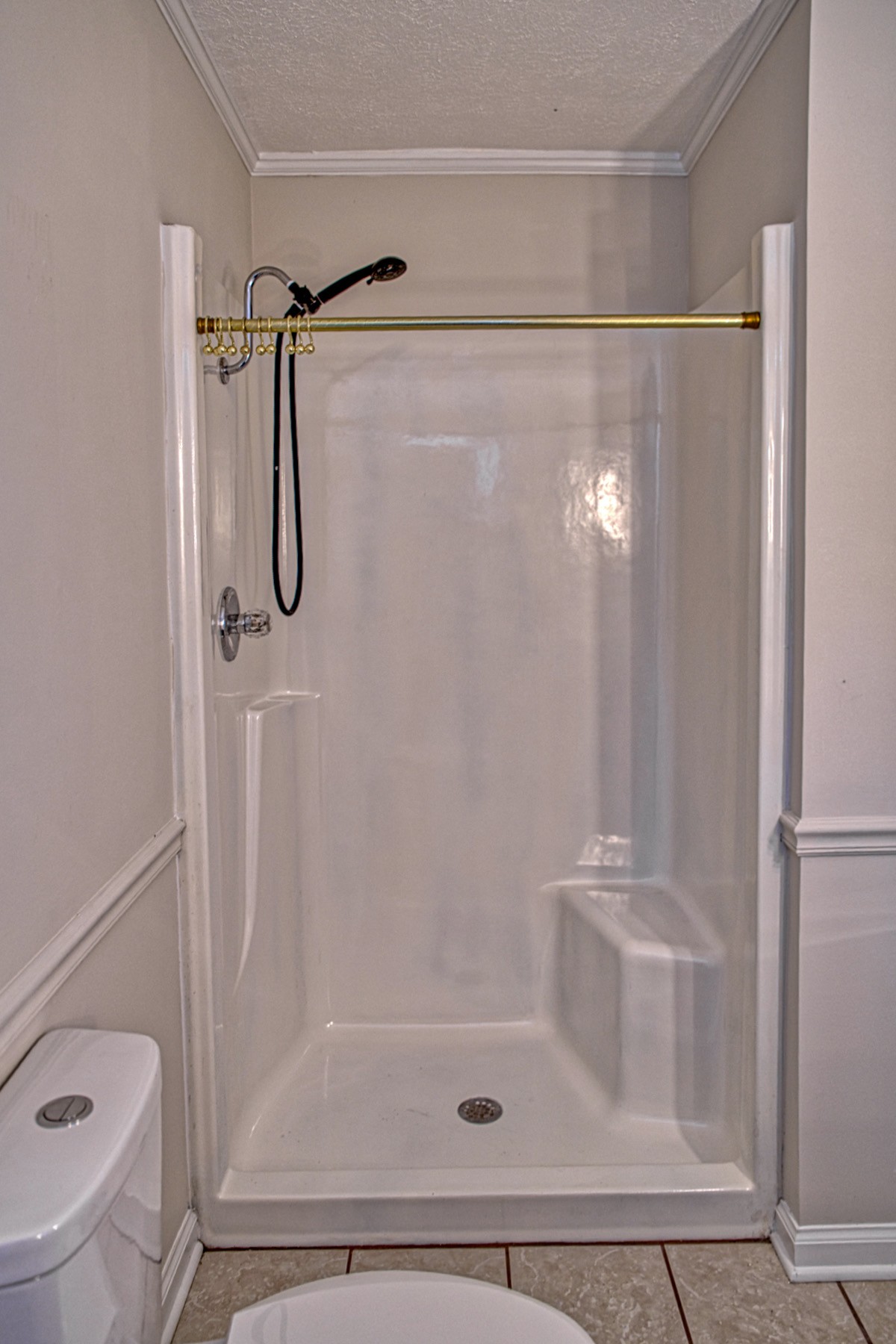 2085 Herbert Garrett Road Cookeville, TN 38506 - Photo 29 of 39 a bathroom with a shower and toilet