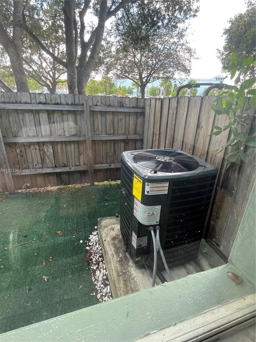 2508 Southeast 14th Avenue, Unit 287 Homestead, FL 33035 - Photo 11 of 17 a view of a chair and table in backyard