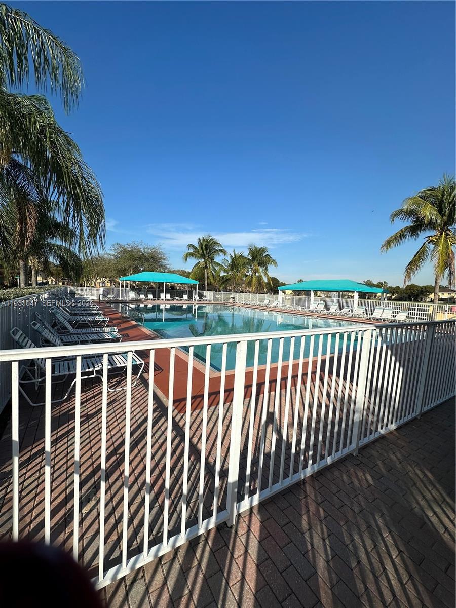 2508 Southeast 14th Avenue, Unit 287 Homestead, FL 33035 - Photo 16 of 17 a view of a balcony with an outdoor space