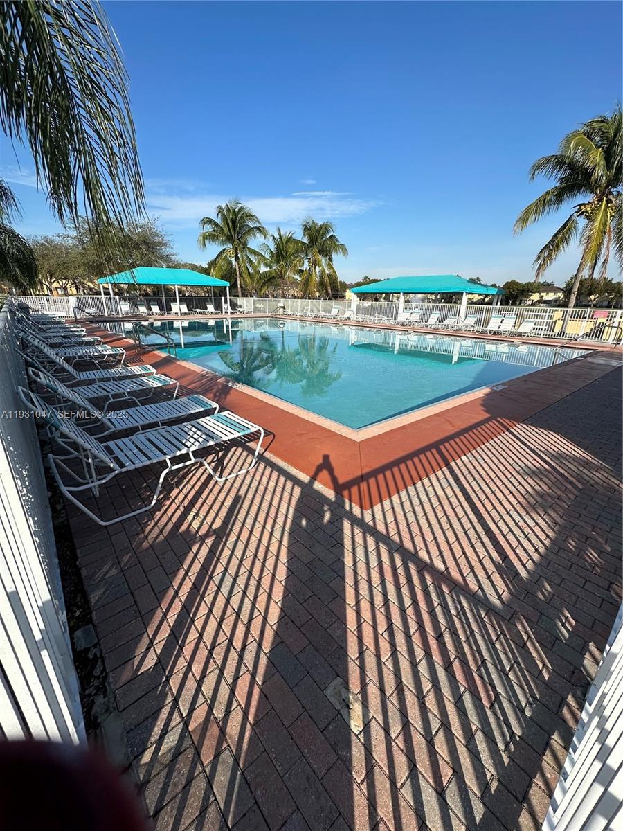 2508 Southeast 14th Avenue, Unit 287 Homestead, FL 33035 - Photo 17 of 17 a view of a patio with wooden floor