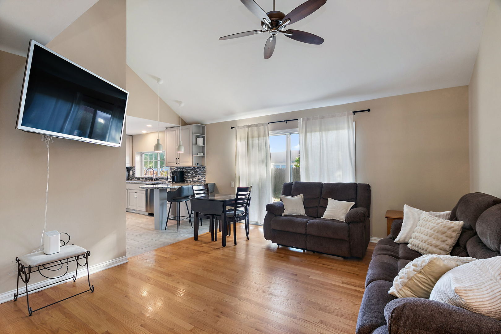 1925 Ozark Parkway Algonquin, IL 60102 - Photo 3 of 17 a living room with furniture and a flat screen tv