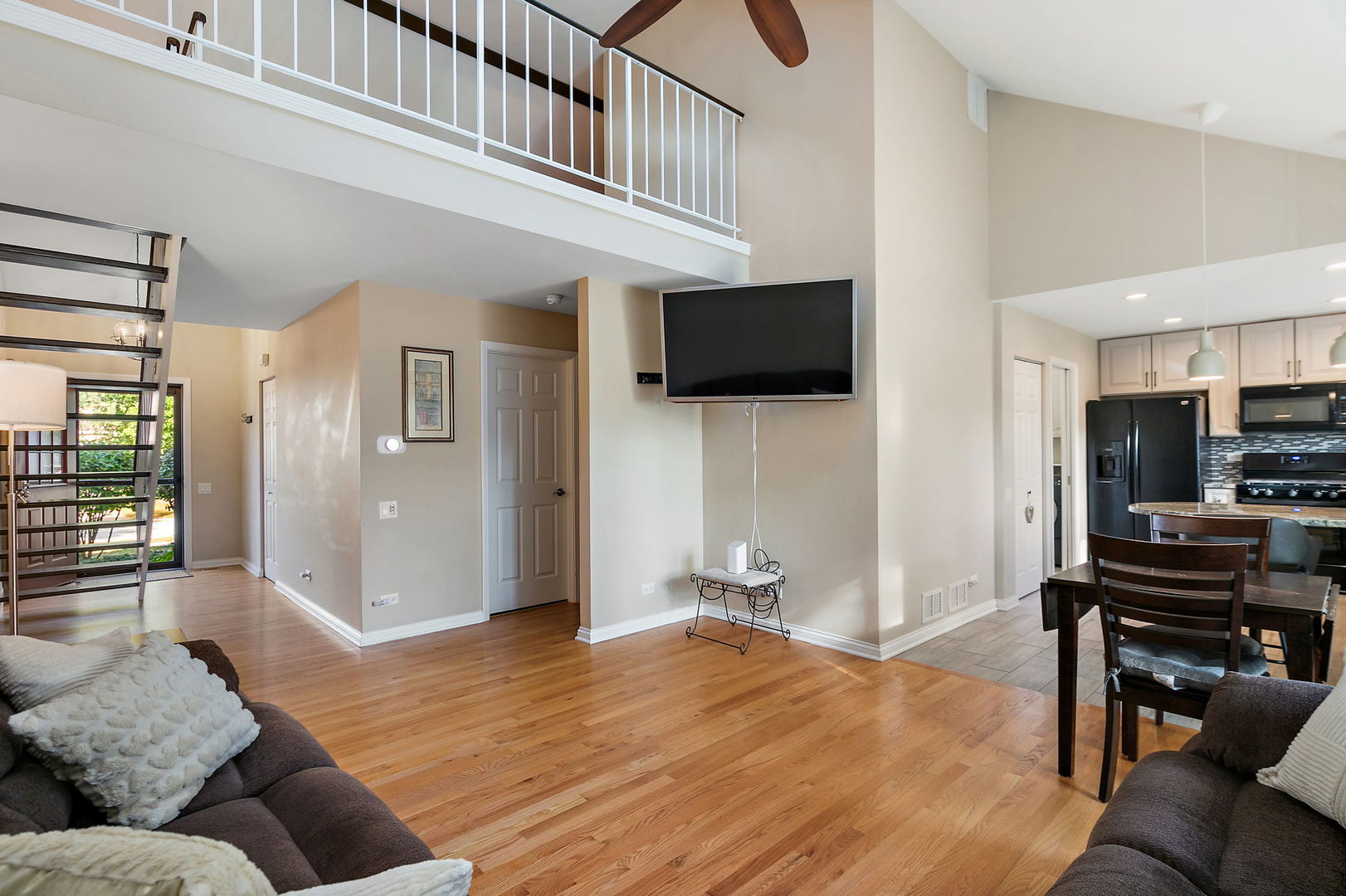 1925 Ozark Parkway Algonquin, IL 60102 - Photo 4 of 17 a living room with furniture and a flat screen tv