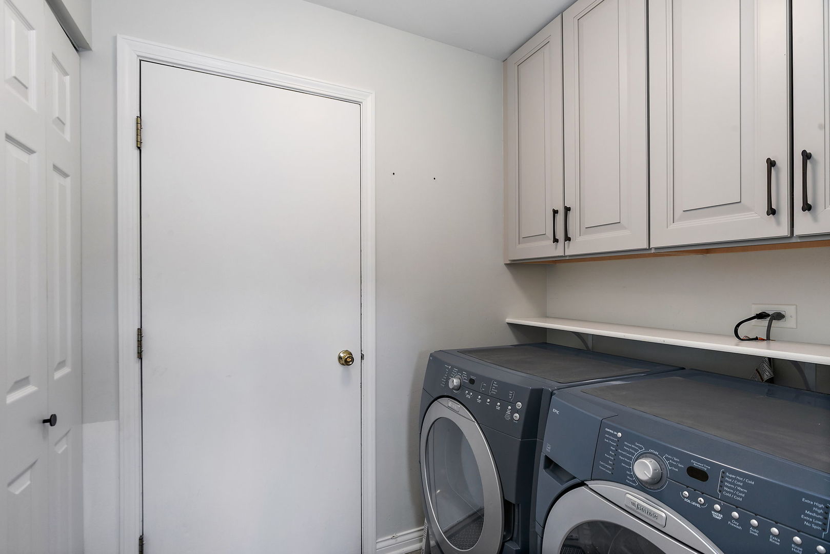 1925 Ozark Parkway Algonquin, IL 60102 - Photo 8 of 17 a view of storage and utility room with washer and dryer