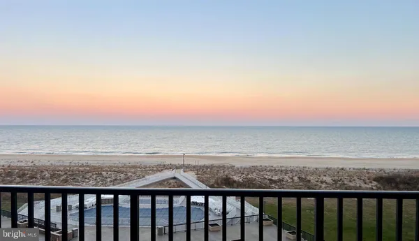 a balcony with an ocean view