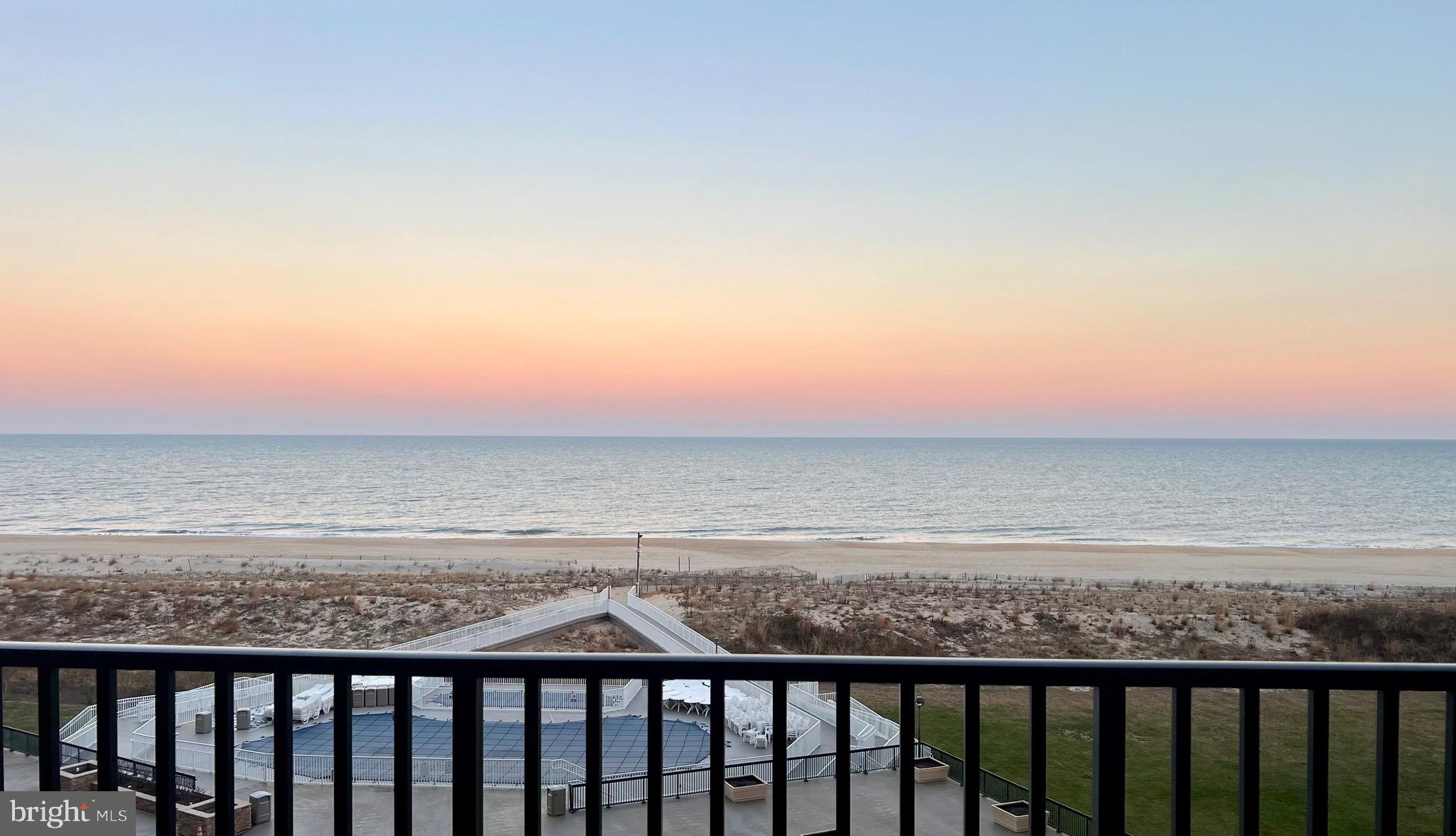 a balcony with an ocean view