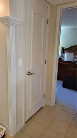 a view of a hallway with closet area