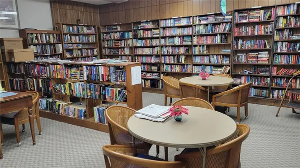 a view of a workspace with furniture