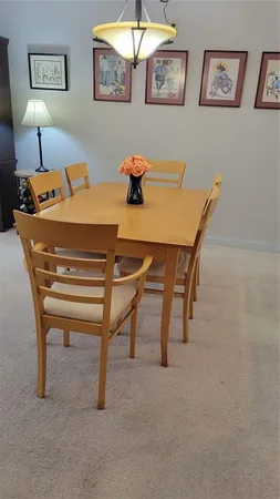 a workspace with furniture and window