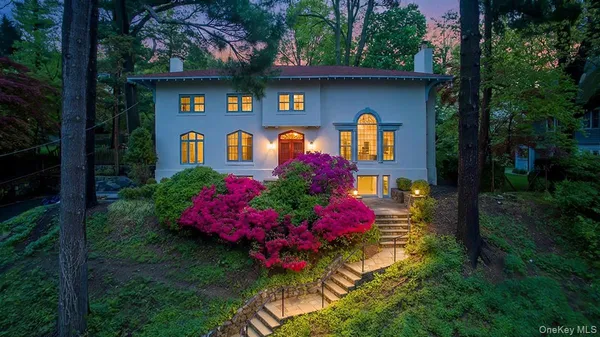 a front view of house with yard