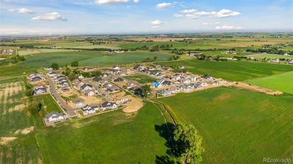 a view of a lake with a big yard