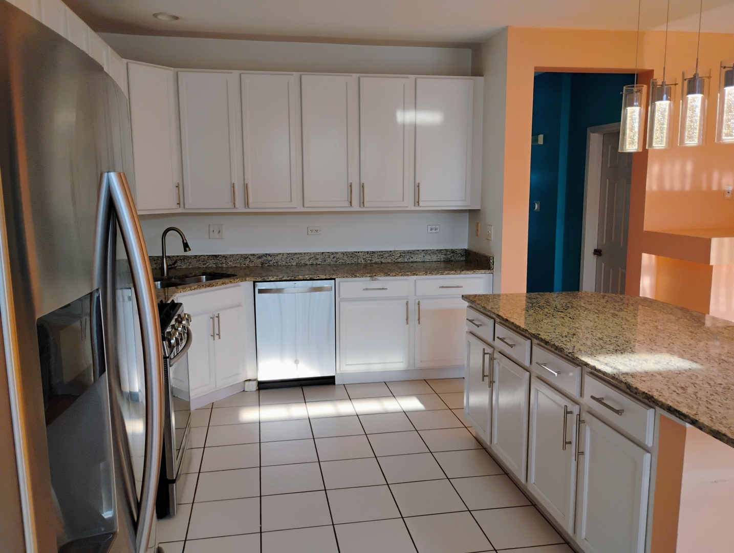 1166 Georgetown Way Vernon Hills, IL 60061 - Photo 11 of 36 a kitchen with stainless steel appliances granite countertop a refrigerator a sink and white cabinets