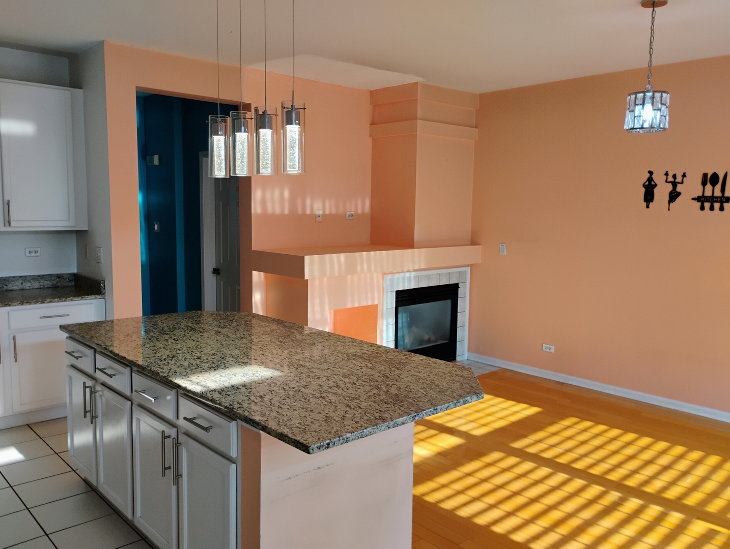 1166 Georgetown Way Vernon Hills, IL 60061 - Photo 12 of 36 a kitchen with a sink granite counter tops and a wooden floor