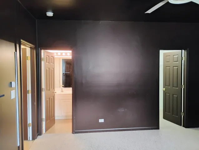 a view of a room with racks on the wall