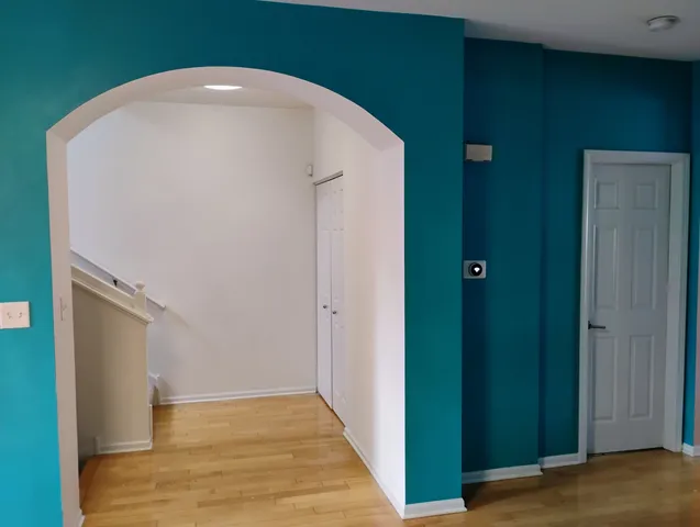 a view of a hallway with closet