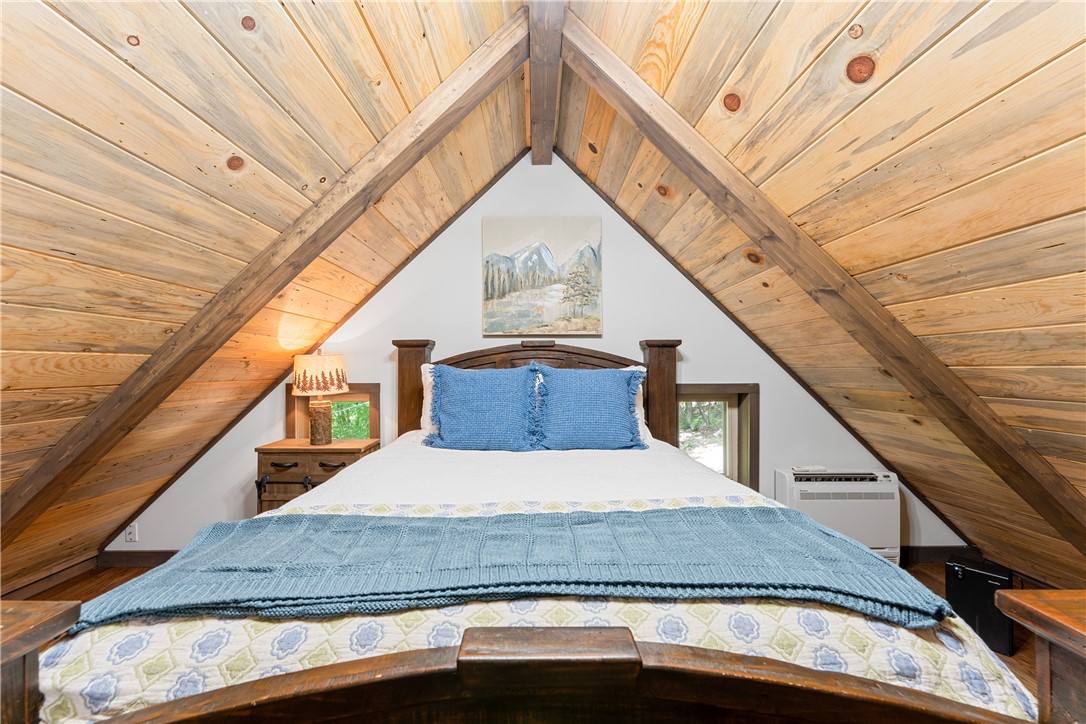 3931 Zack Road Marshall, AR 72650 - Photo 19 of 56 Bedroom with a wood ceiling with exposed beams