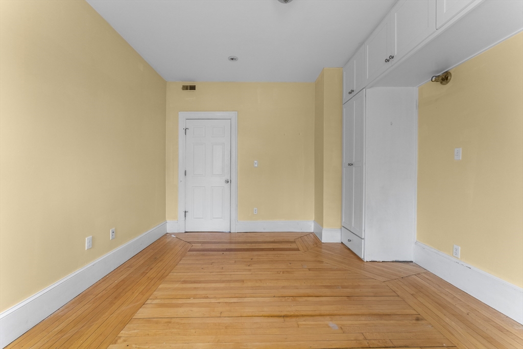 571 Washington Street, Unit 1 Boston, MA 02135 - Photo 6 of 13 a view of an empty room