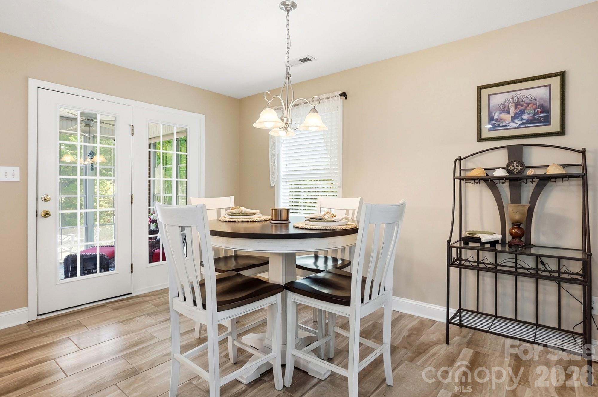 3324 Muddy Creek Road Midland, NC 28107 - Photo 17 of 46 a view of a dining room with furniture window and outside view