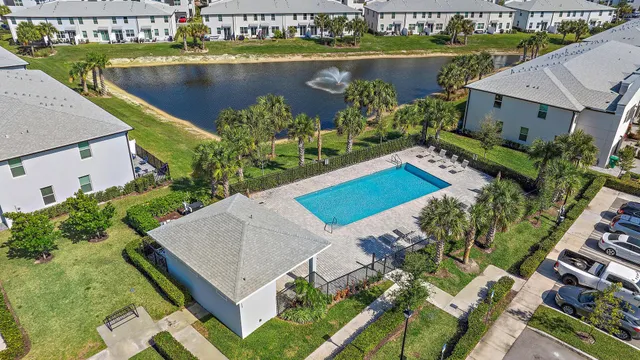 an aerial view of a house with a lake view