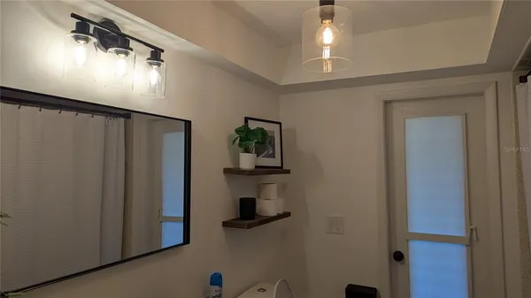 a view of a hallway with entryway