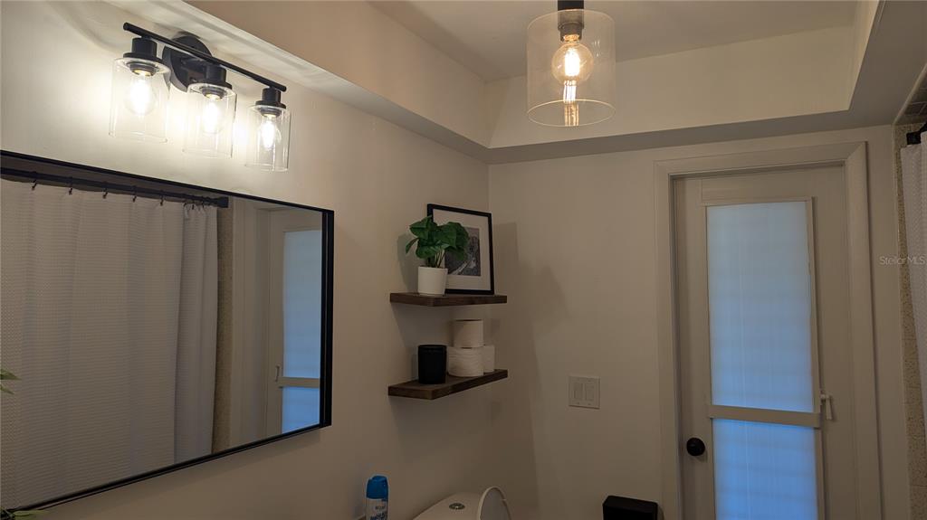 173 Rotonda Circle Rotonda West, FL 33947 - Photo 8 of 13 a view of a hallway with entryway