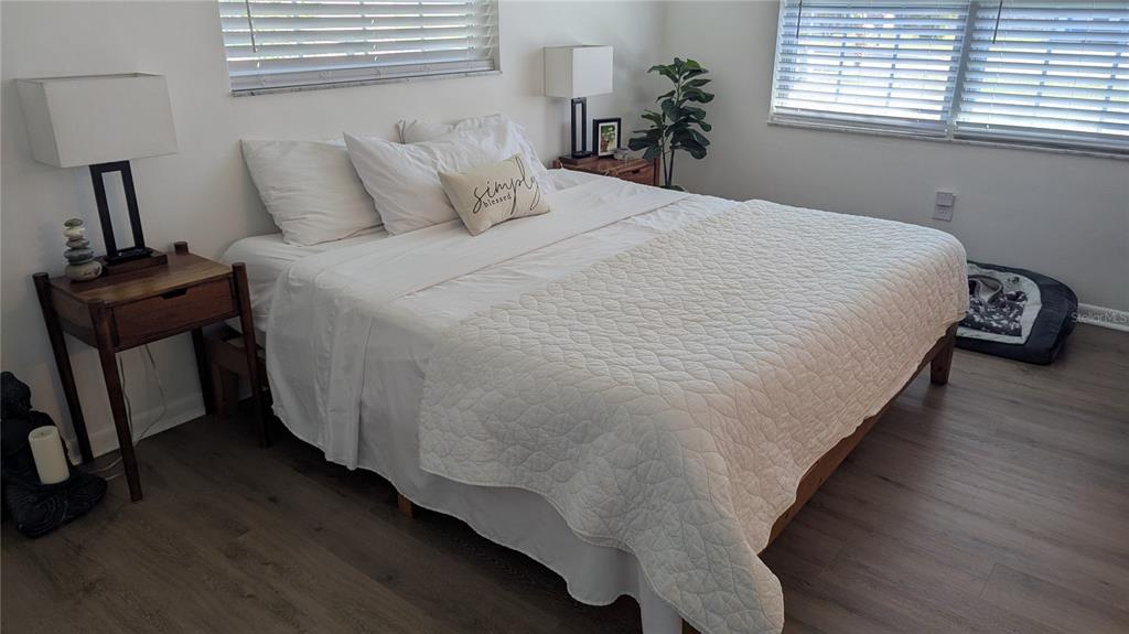 173 Rotonda Circle Rotonda West, FL 33947 - Photo 10 of 13 a bedroom with a bed and a window