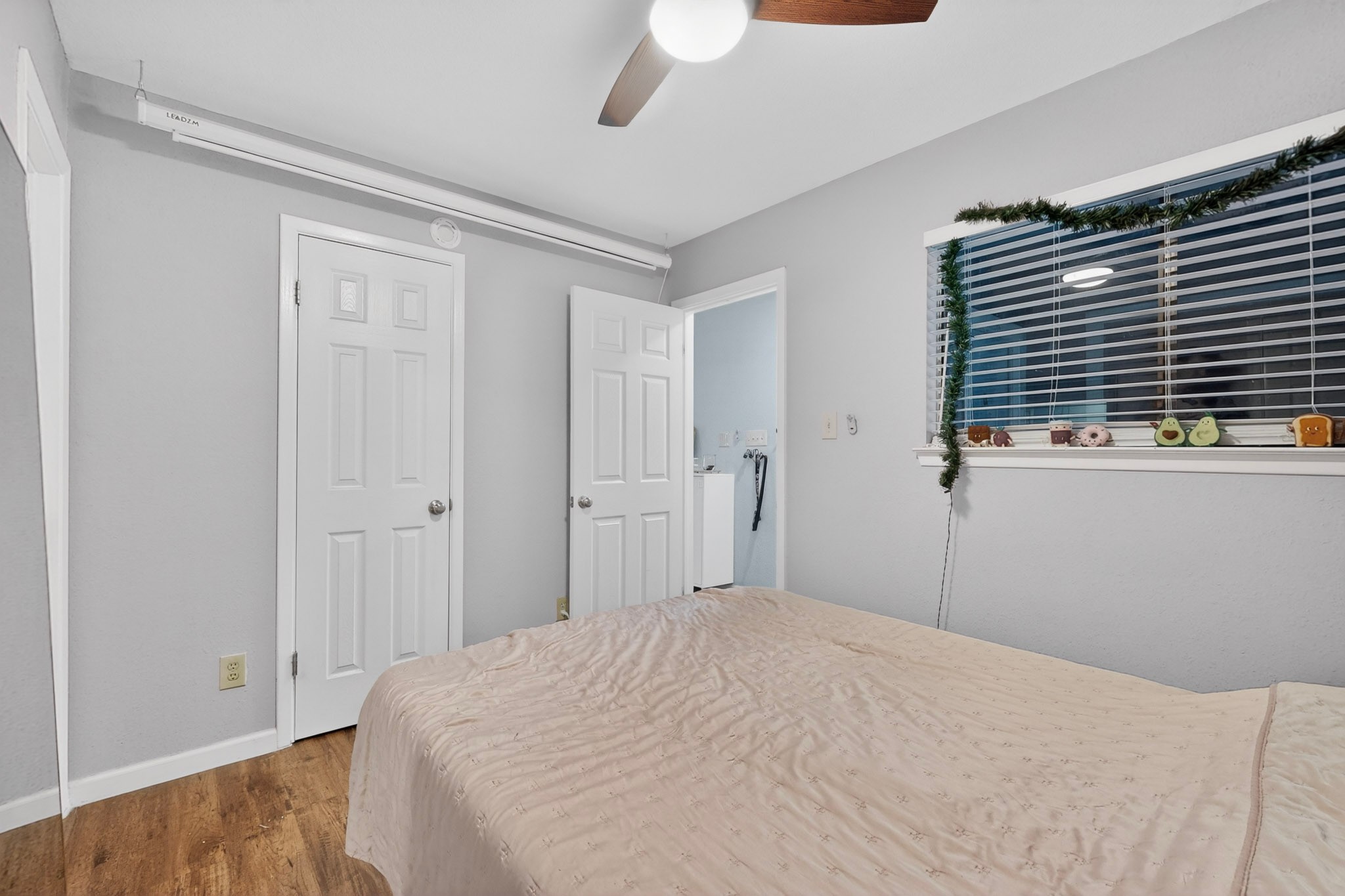 2500 Burleson Road, Unit 506 Austin, TX 78741 - Photo 16 of 23 a bedroom with a bed and a window