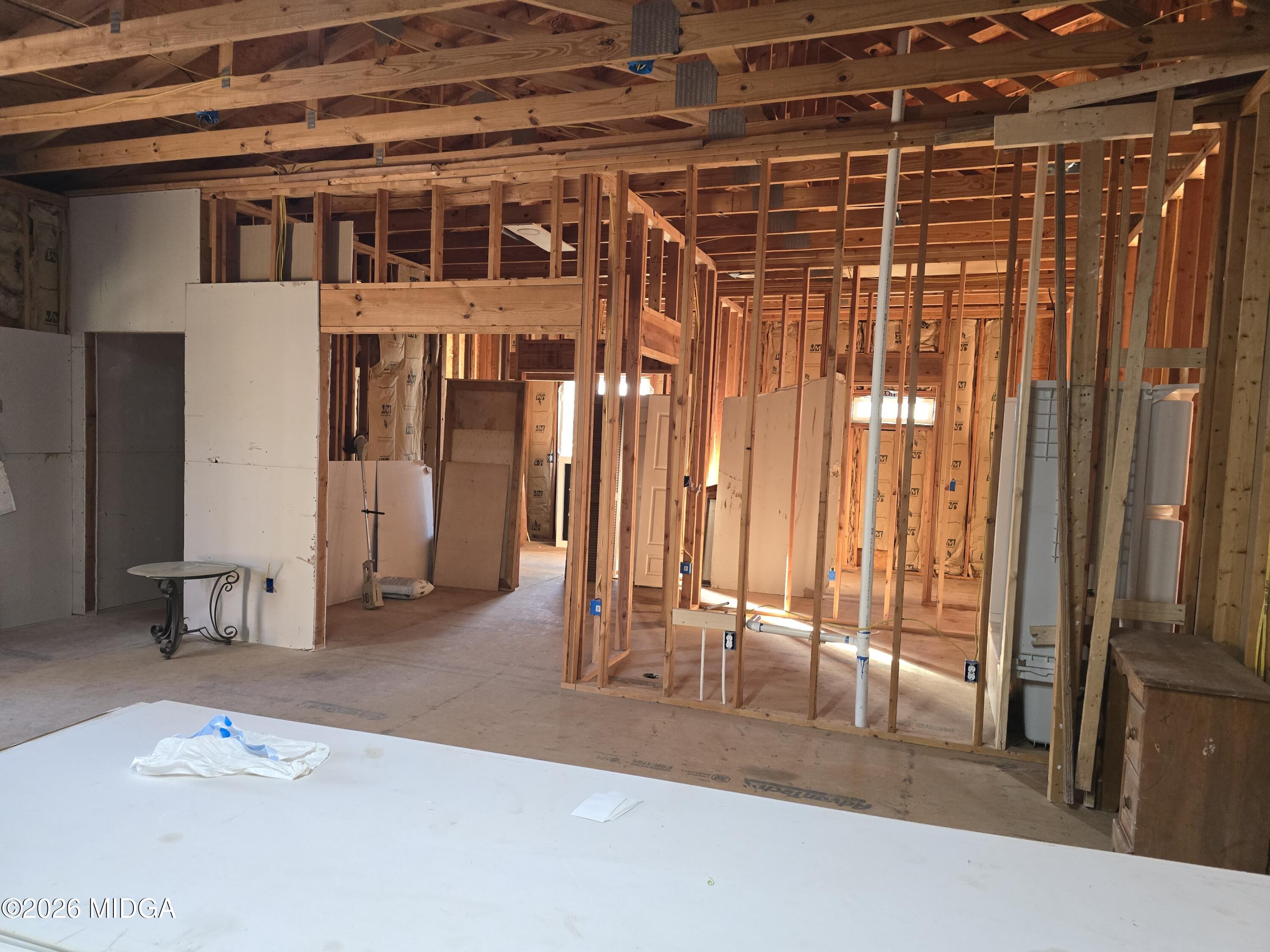 253 Pottery Road Lizella, GA 31052 - Photo 17 of 31 a view of a room with wooden floor and windows