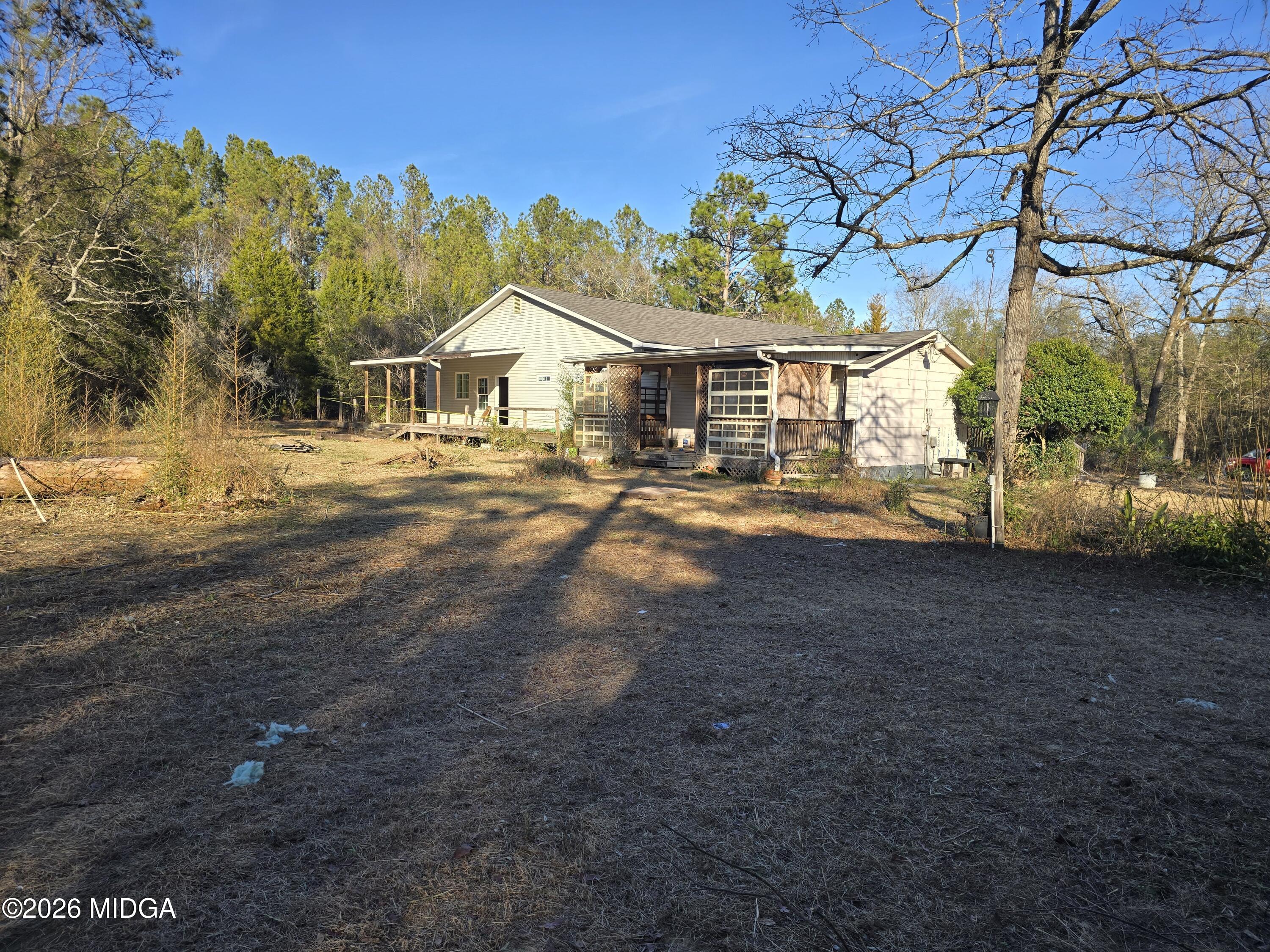 253 Pottery Road Lizella, GA 31052 - Photo 5 of 31 a front view of a house with a yard