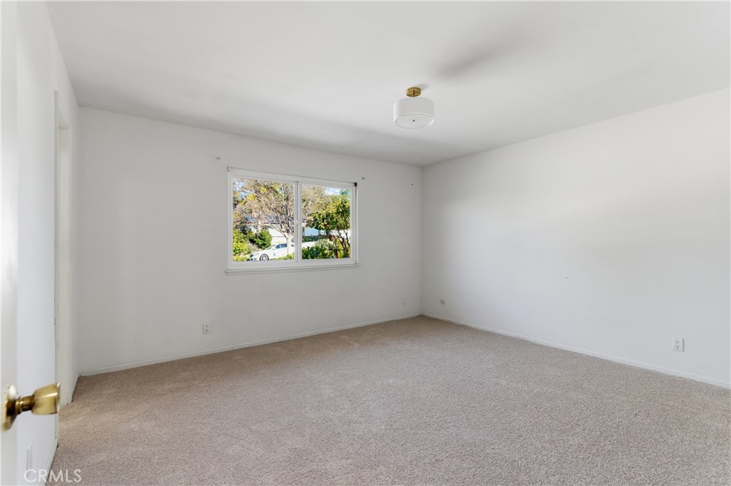 26136 Veva Way Calabasas, CA 91302 - Photo 13 of 22 an empty room with windows