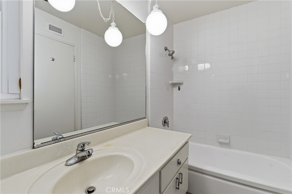 26136 Veva Way Calabasas, CA 91302 - Photo 19 of 22 a bathroom with a sink and a mirror