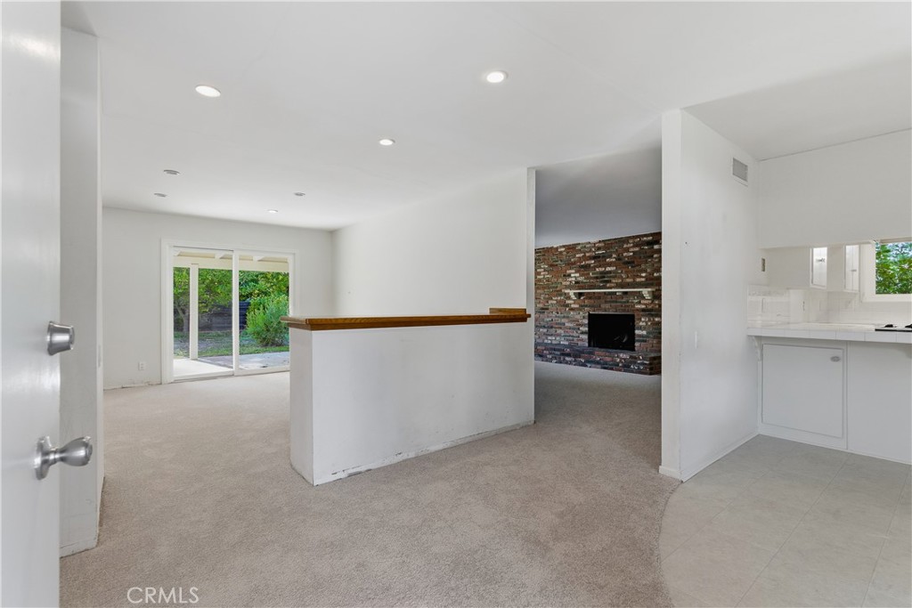 26136 Veva Way Calabasas, CA 91302 - Photo 4 of 22 a view of an empty room with a window