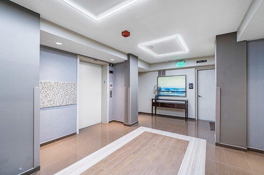 3407 South Ocean Boulevard, Unit PHB Highland Beach, FL 33487 - Photo 44 of 49 a view of workspace with wooden floor and furniture