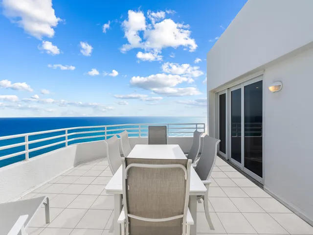a view of a terrace with furniture
