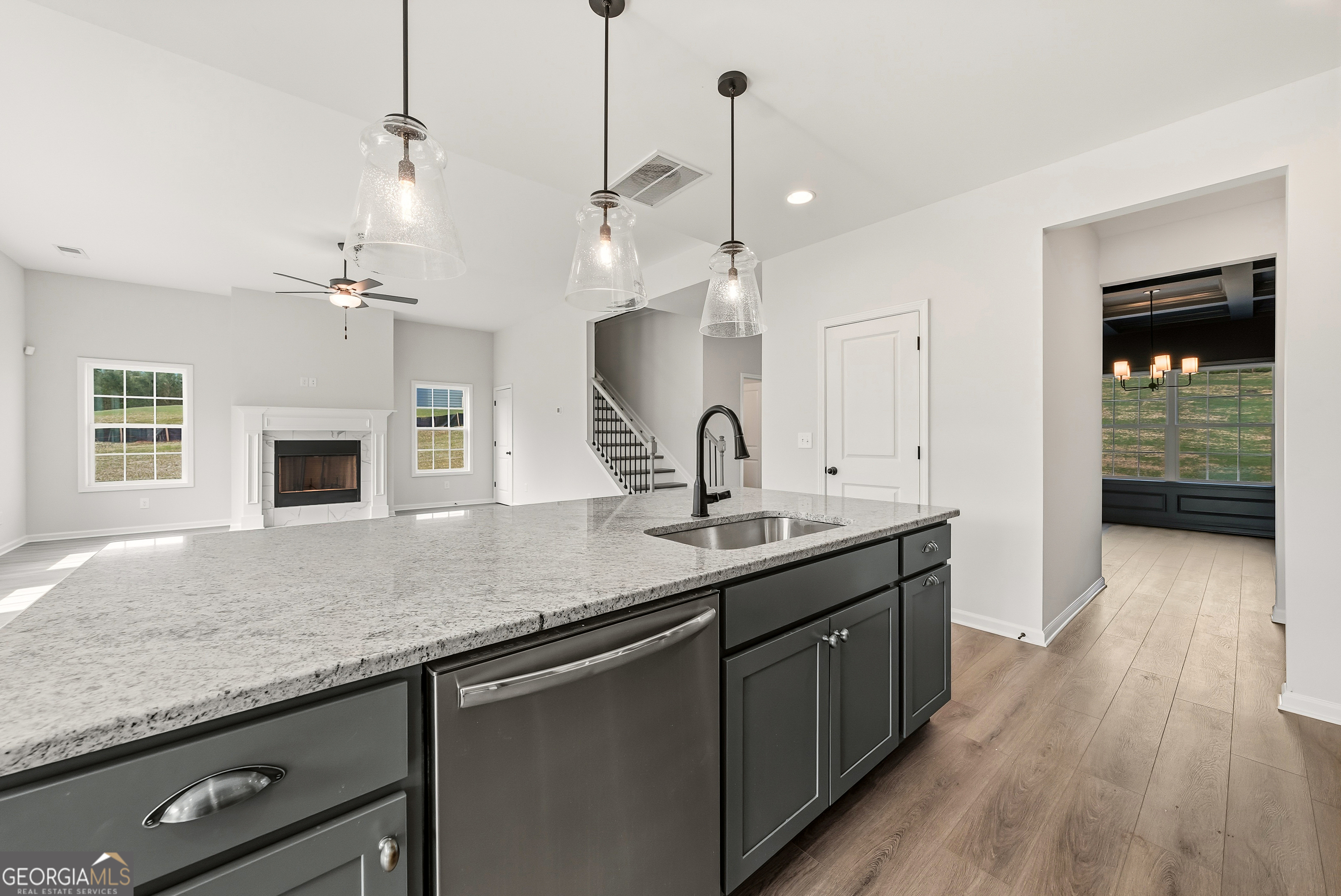 110 Hawkeye Trail, Unit 83 Fortson, GA 31808 - Photo 13 of 43 a kitchen with sink stove and cabinets