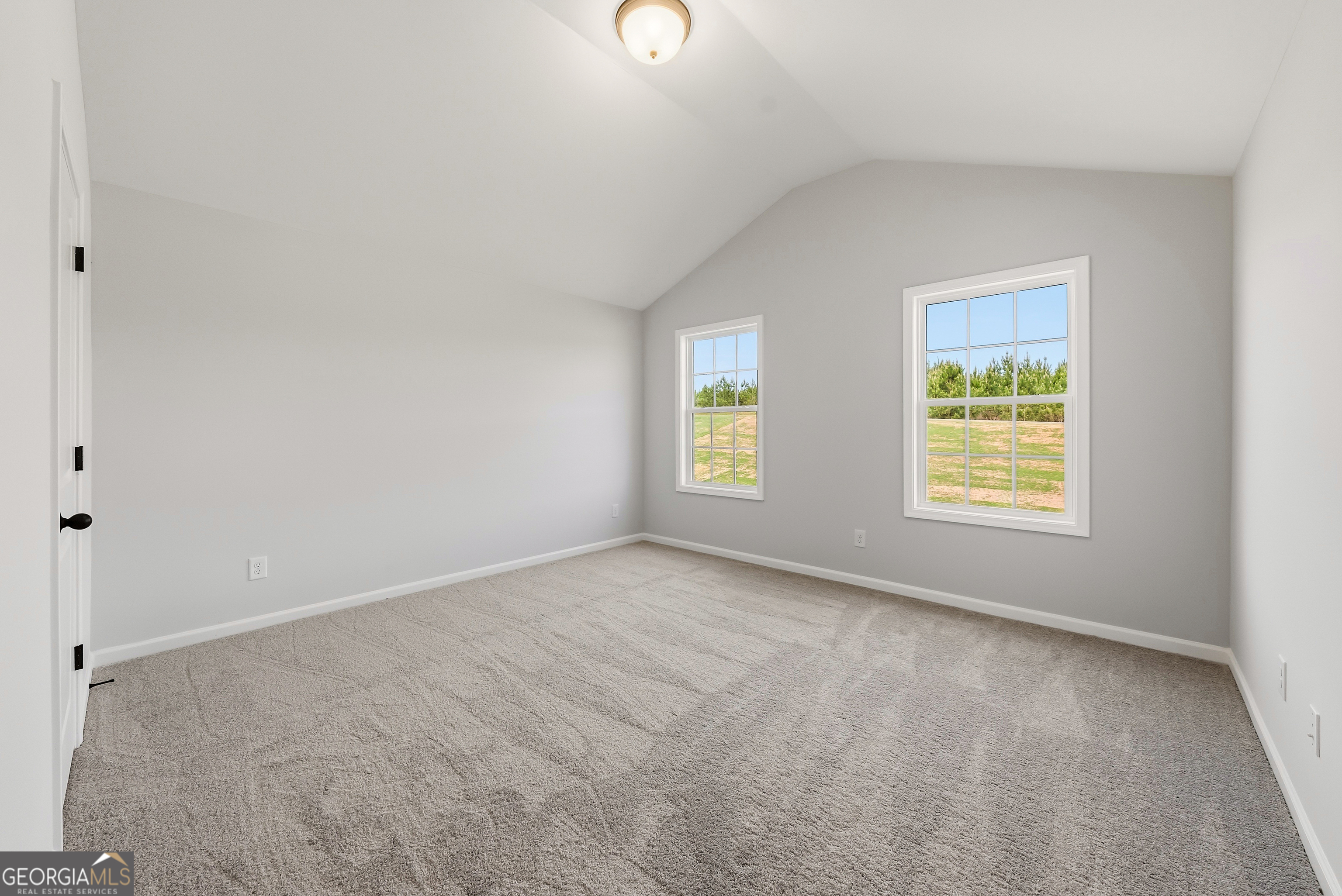 110 Hawkeye Trail, Unit 83 Fortson, GA 31808 - Photo 23 of 43 an empty room with windows