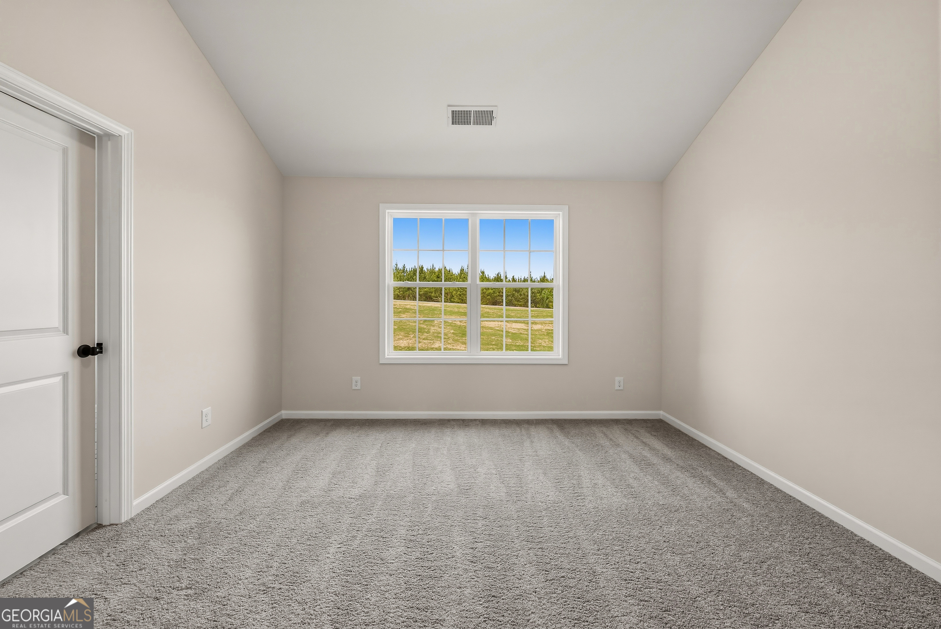 110 Hawkeye Trail, Unit 83 Fortson, GA 31808 - Photo 29 of 43 a view of an empty room with a window