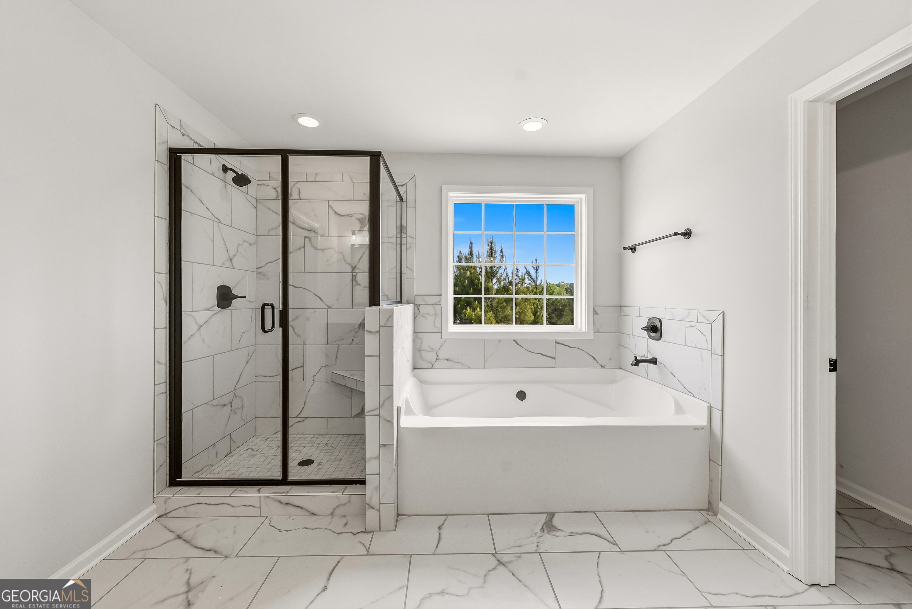 110 Hawkeye Trail, Unit 83 Fortson, GA 31808 - Photo 36 of 43 a bathroom with a bathtub and a shower