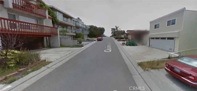 a view of a house with a street